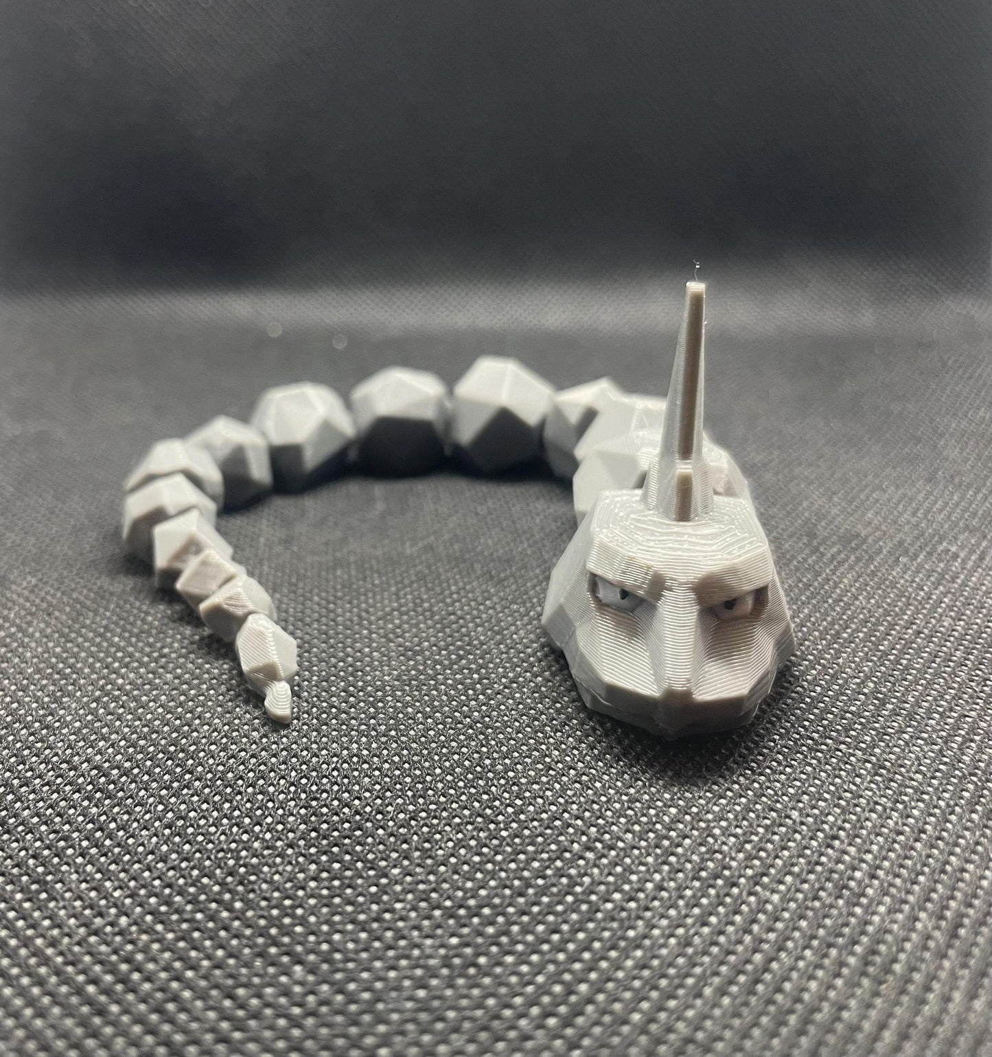 Articulating/flexible Onyx Pokemon fidget